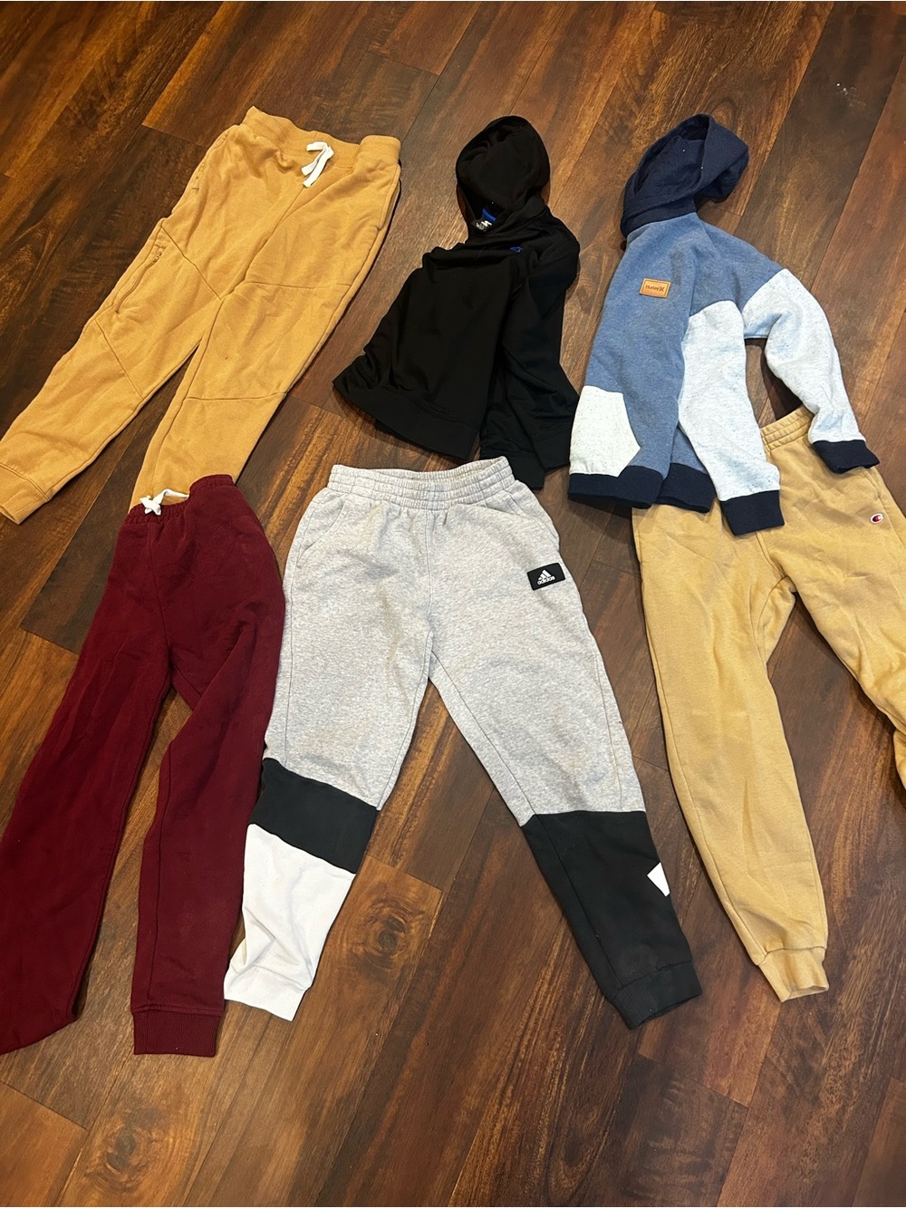 Boys lot hoodies and sweatpants. adidas, hurley, champion, child. 10-12 medium